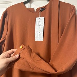 Long sleeve maxi dress with belt. Anna Harriri